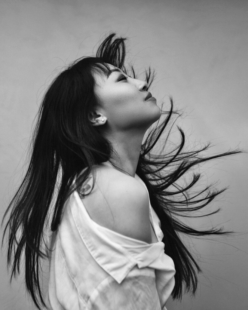 Michelle, black and white, hair loose in the wind